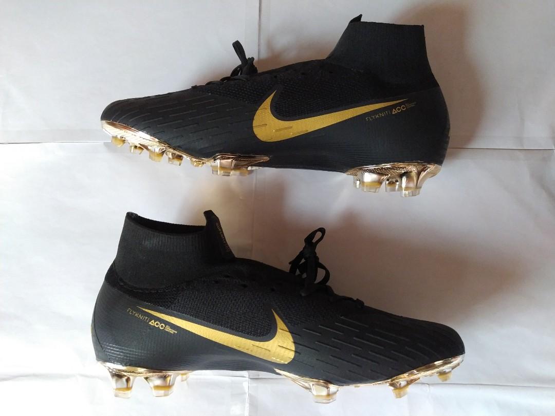 Gold and black football boots online