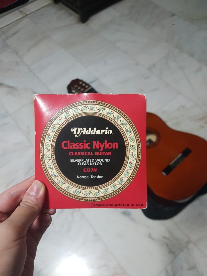 Classical Guitar (with replacement string) (Category: Musical Instruments) located in Singapore. Submitted by byanyname (Listing ID 284338913, Image 4). Description: Bought from Synwin, comes with guitar case. D string broke. Throwing in a pack of D'Addario Classic Nylon strings, you can change it on your own..
