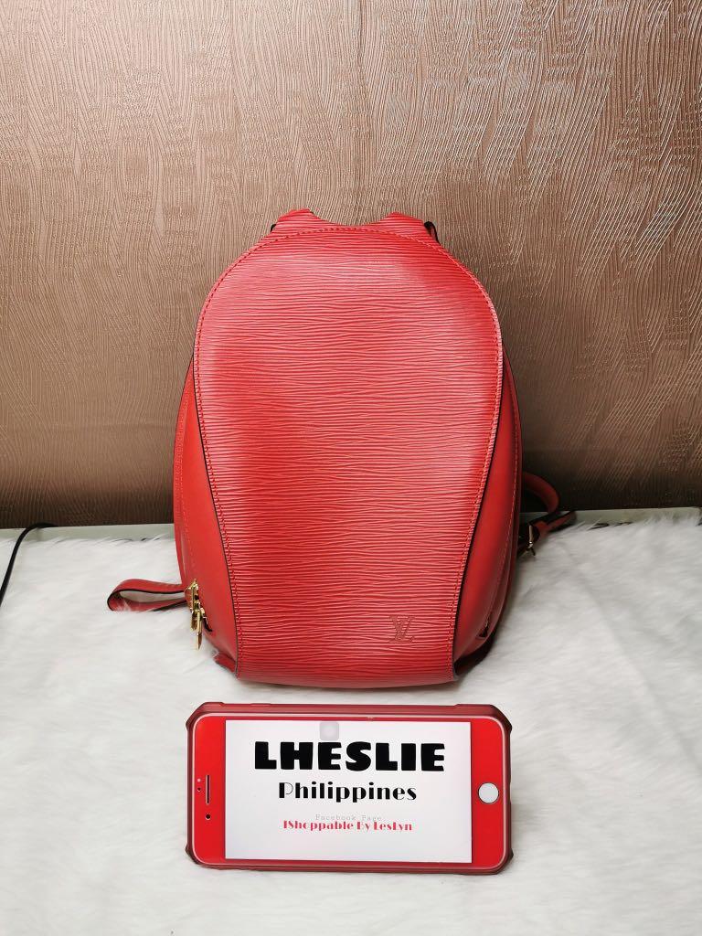 Louis Vuitton Mabillion Backpack Epi Red (Category: Luxury Bags & Wallets) located in Cabatuan. Submitted by ishoppable (Listing ID 284235115, Image 1). Description: Mabillion Backpack 💯 Original with Authenticity Letter. Good as new backpack, I can’t see any major flaws. Hardware is still gold, zipper works perfectly. No cracks m, tears or dryness in the canvass. This bag comes with a dustbag. No string or foul odor. Please check individual pho