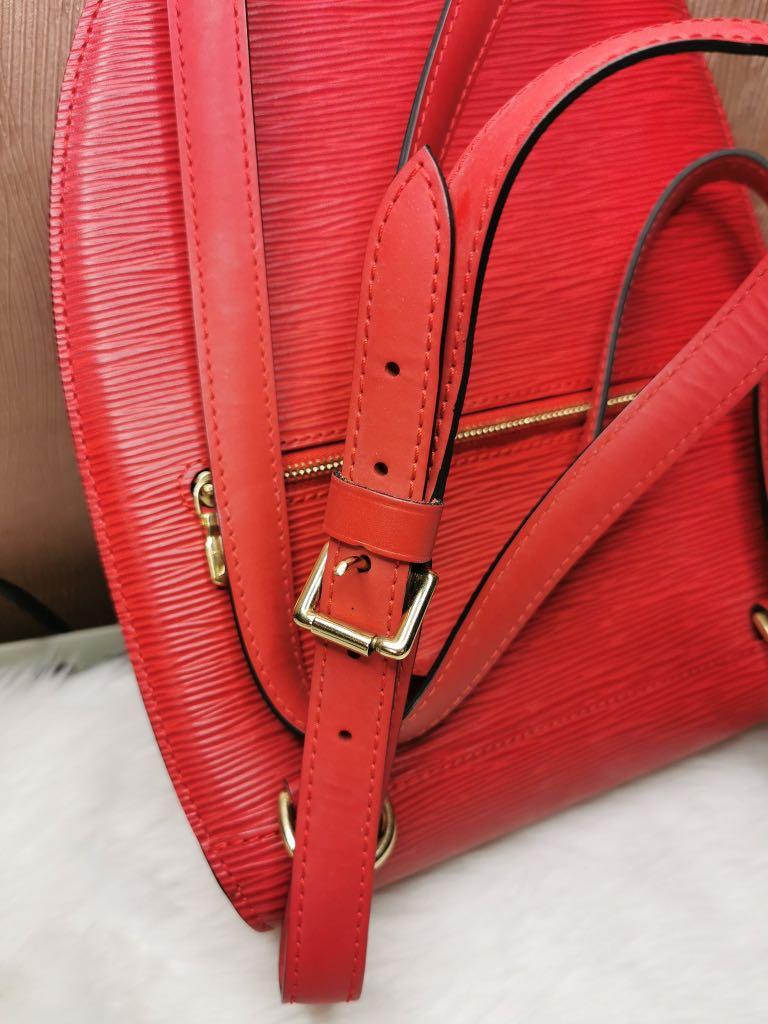 Louis Vuitton Mabillion Backpack Epi Red (Category: Luxury Bags & Wallets) located in Cabatuan. Submitted by ishoppable (Listing ID 284235115, Image 3). Description: Mabillion Backpack 💯 Original with Authenticity Letter. Good as new backpack, I can’t see any major flaws. Hardware is still gold, zipper works perfectly. No cracks m, tears or dryness in the canvass. This bag comes with a dustbag. No string or foul odor. Please check individual pho