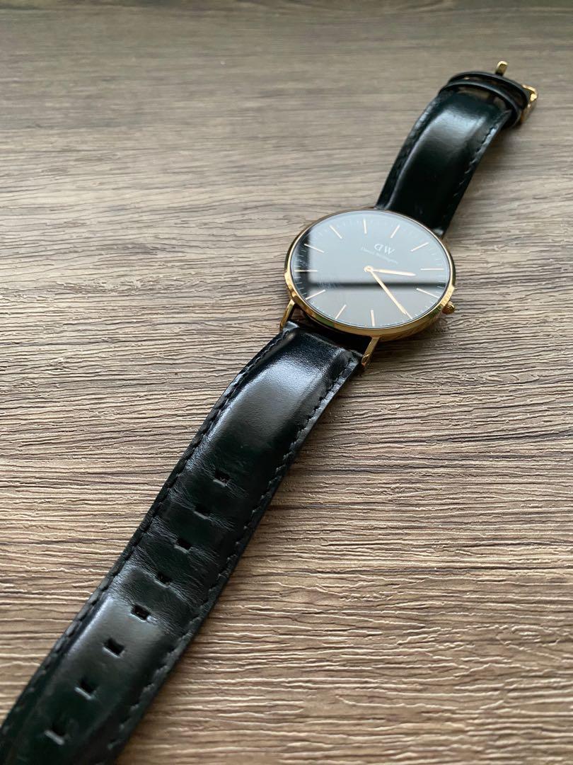 Daniel wellington black new arrivals and gold watch