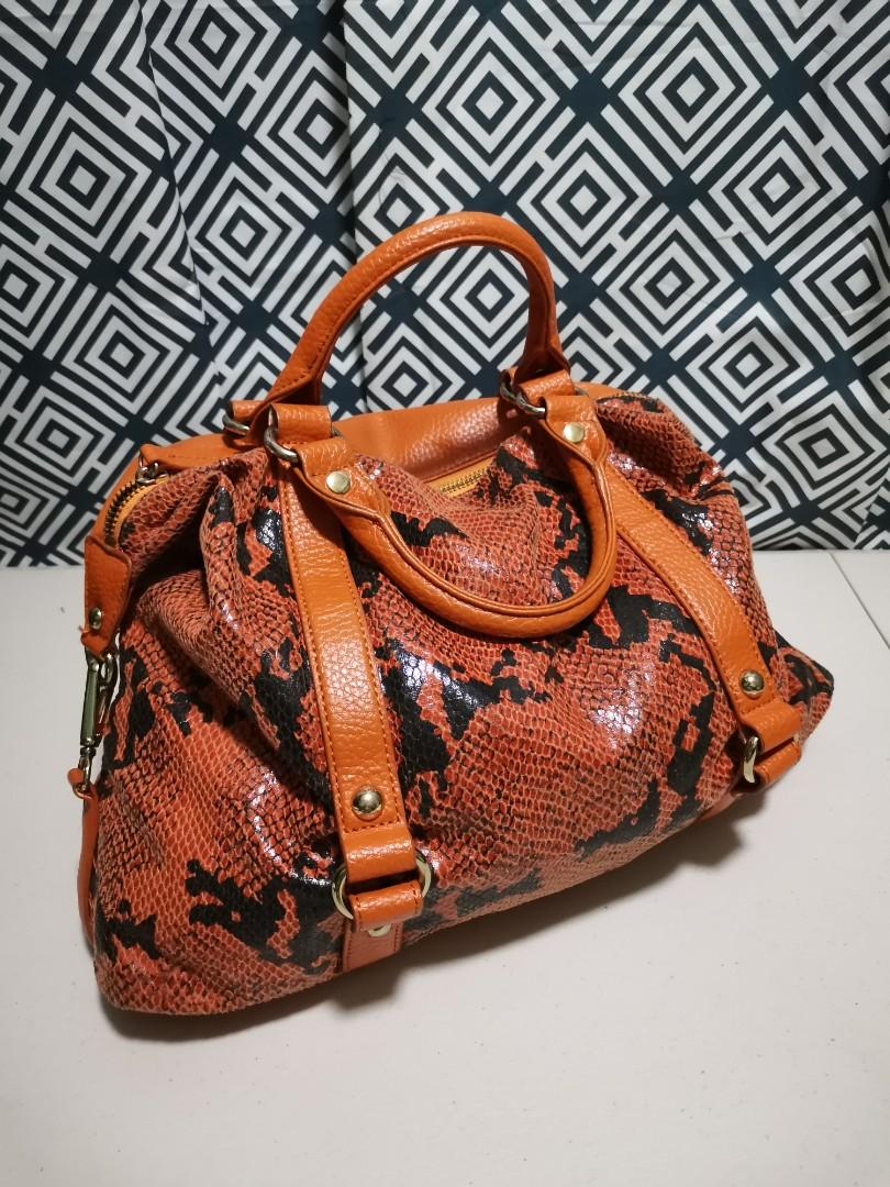 Orange snakeskin purse store