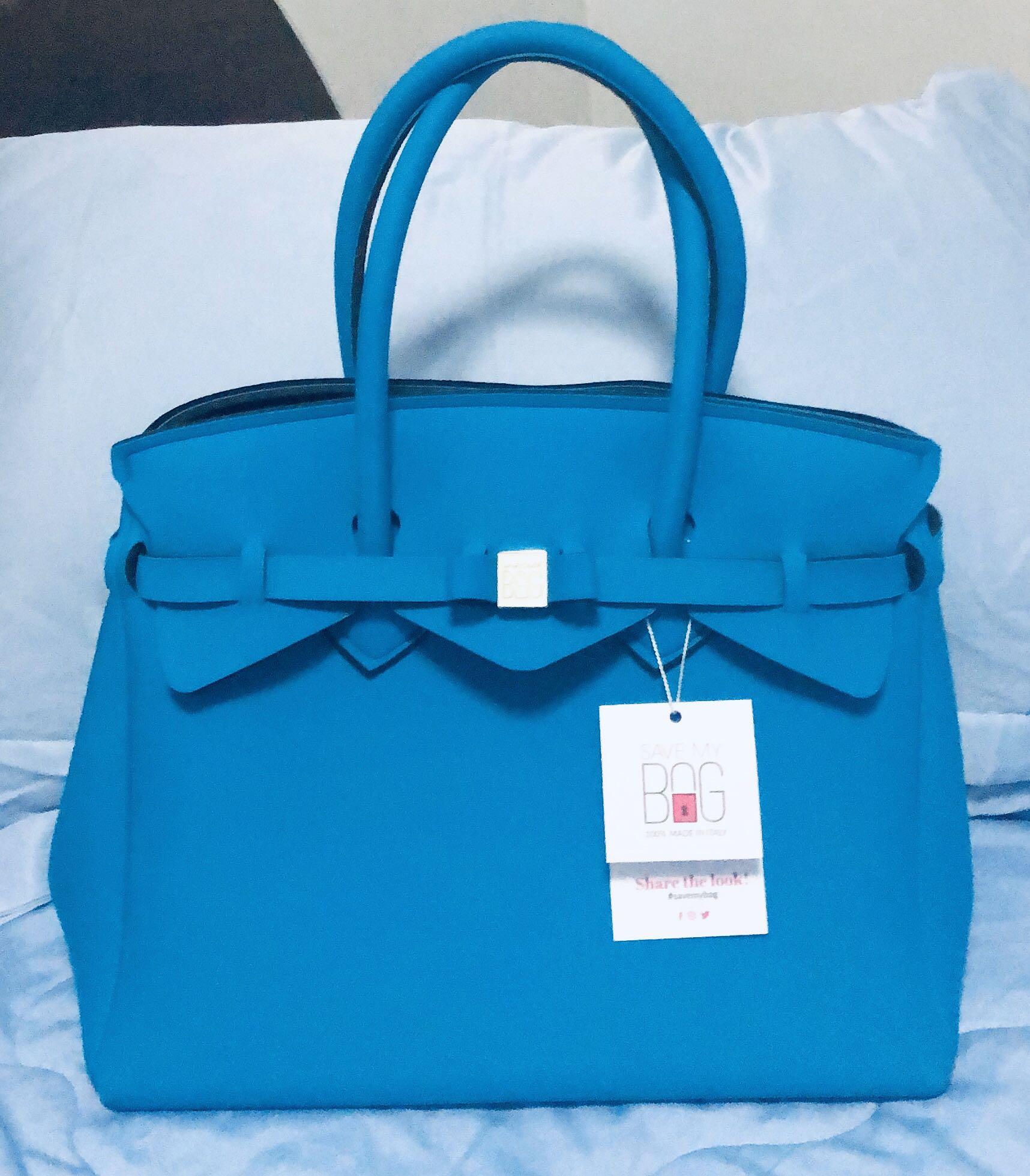 Peacock blue bag on sale