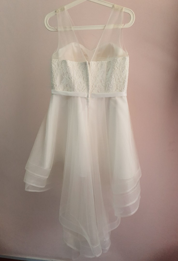 White lace layer tail dress with a ribbon in front