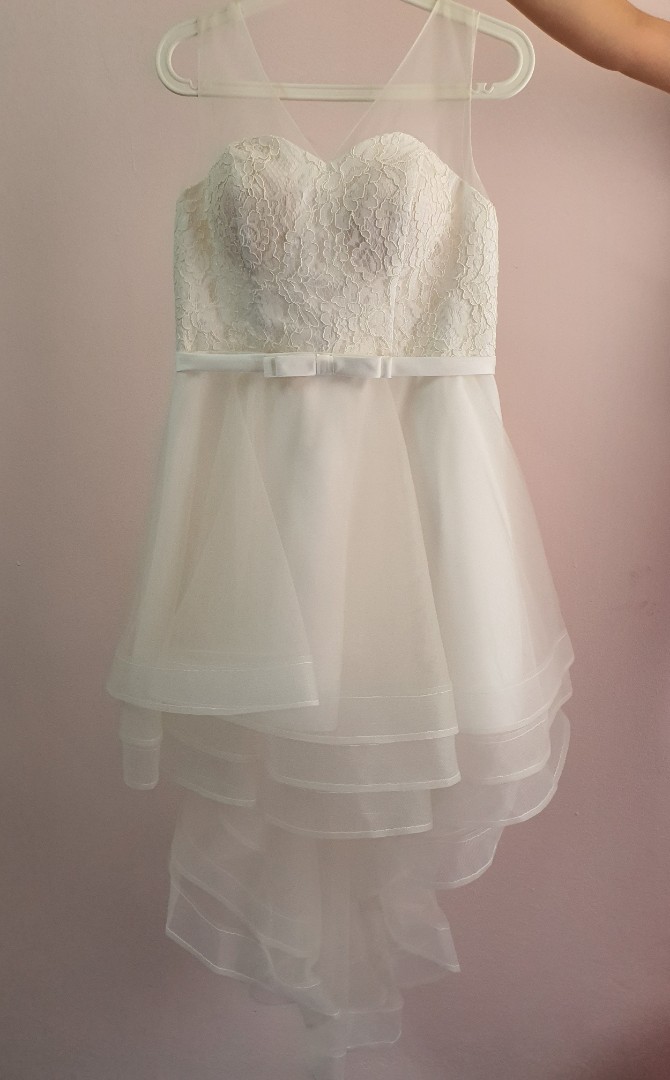 White lace layer tail dress with a ribbon in front