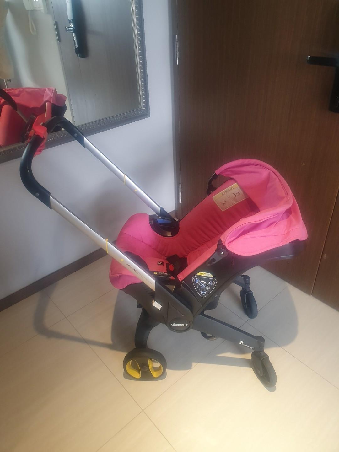 doona car seat stroller pink