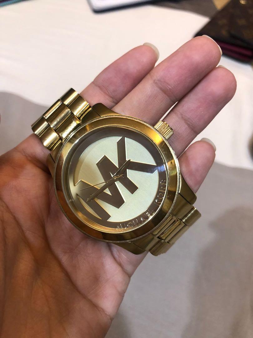 Michael Kors Gold oversized watch (Category: Women's Watches) located in Quezon City. Submitted by maycuenca (Listing ID 285011026, Image 1). Description: - good as new, seldom used, RFS: decluttering - complete with original box, packaging and manual.