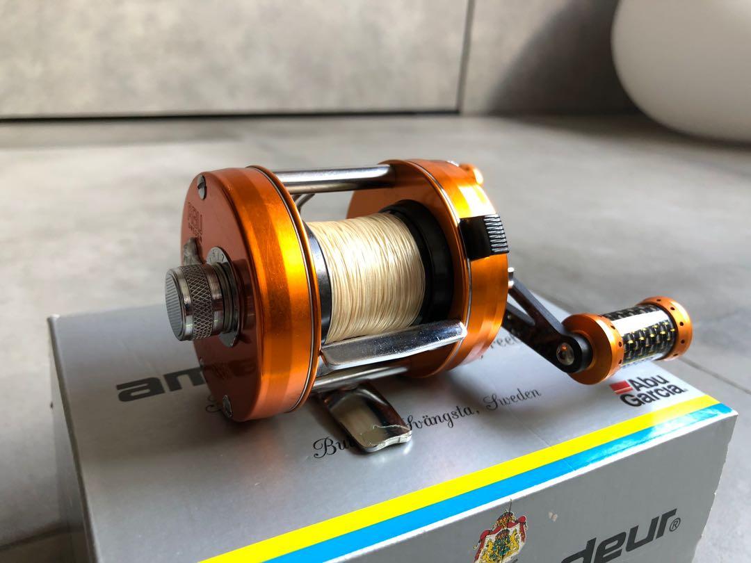 https://media.karousell.com/media/photos/products/2020/03/27/abu_garcia_2500c_sunset_orange_limited_edition_1585280167_7ce9d538_progressive.jpg