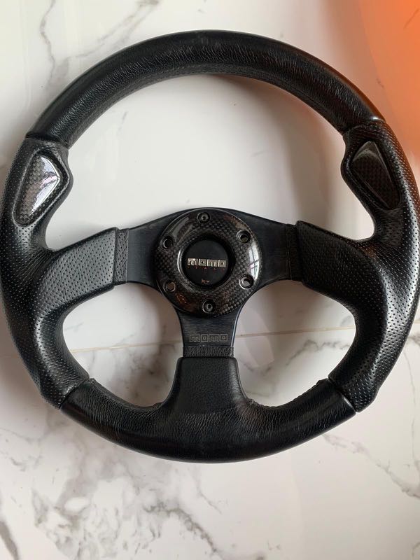 Authentic Momo Jet Black steering wheel, Car Accessories, Accessories on  Carousell