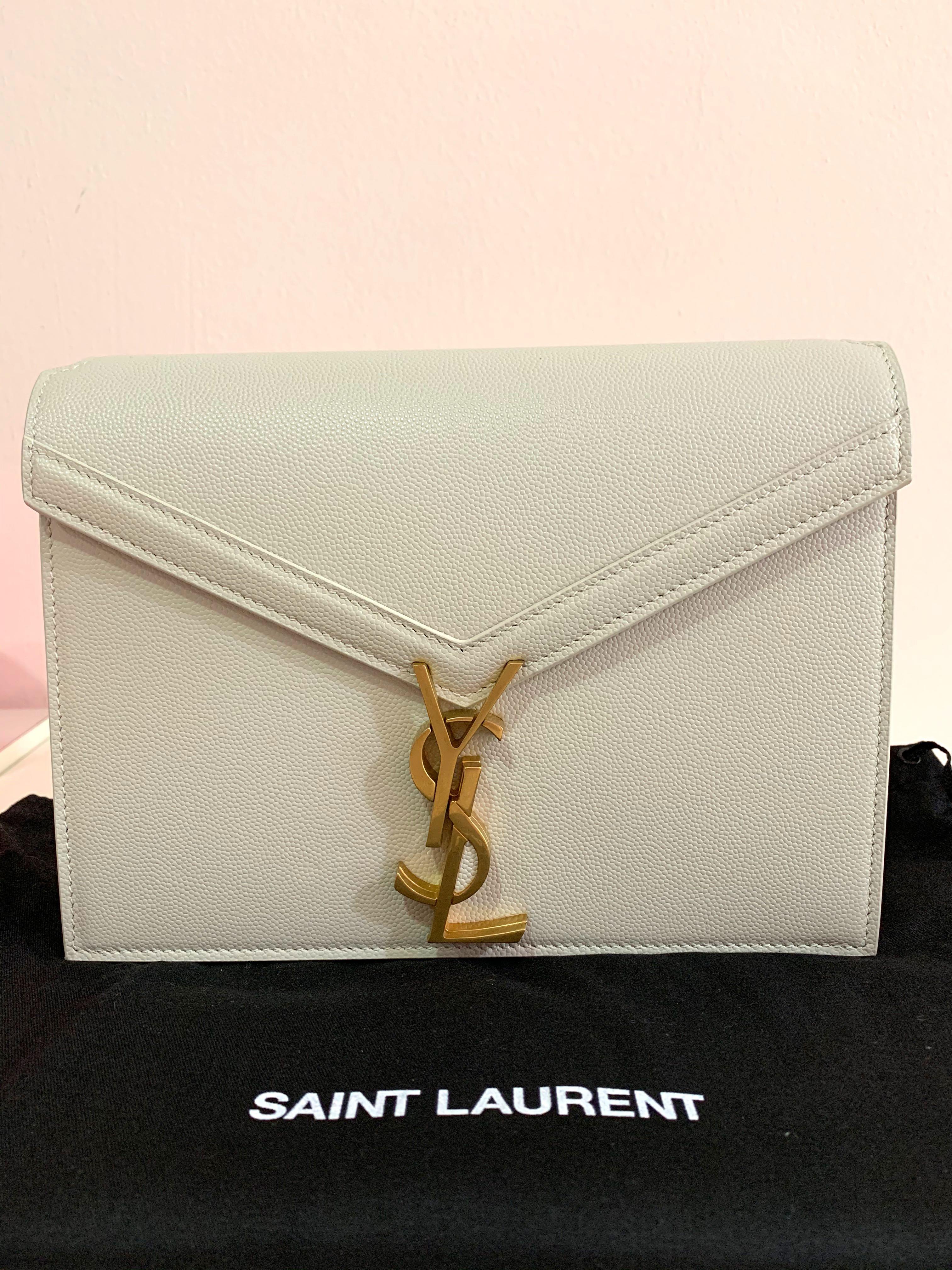 Cassandra monogram clasp bag in grain de poudre embossed on sale leather