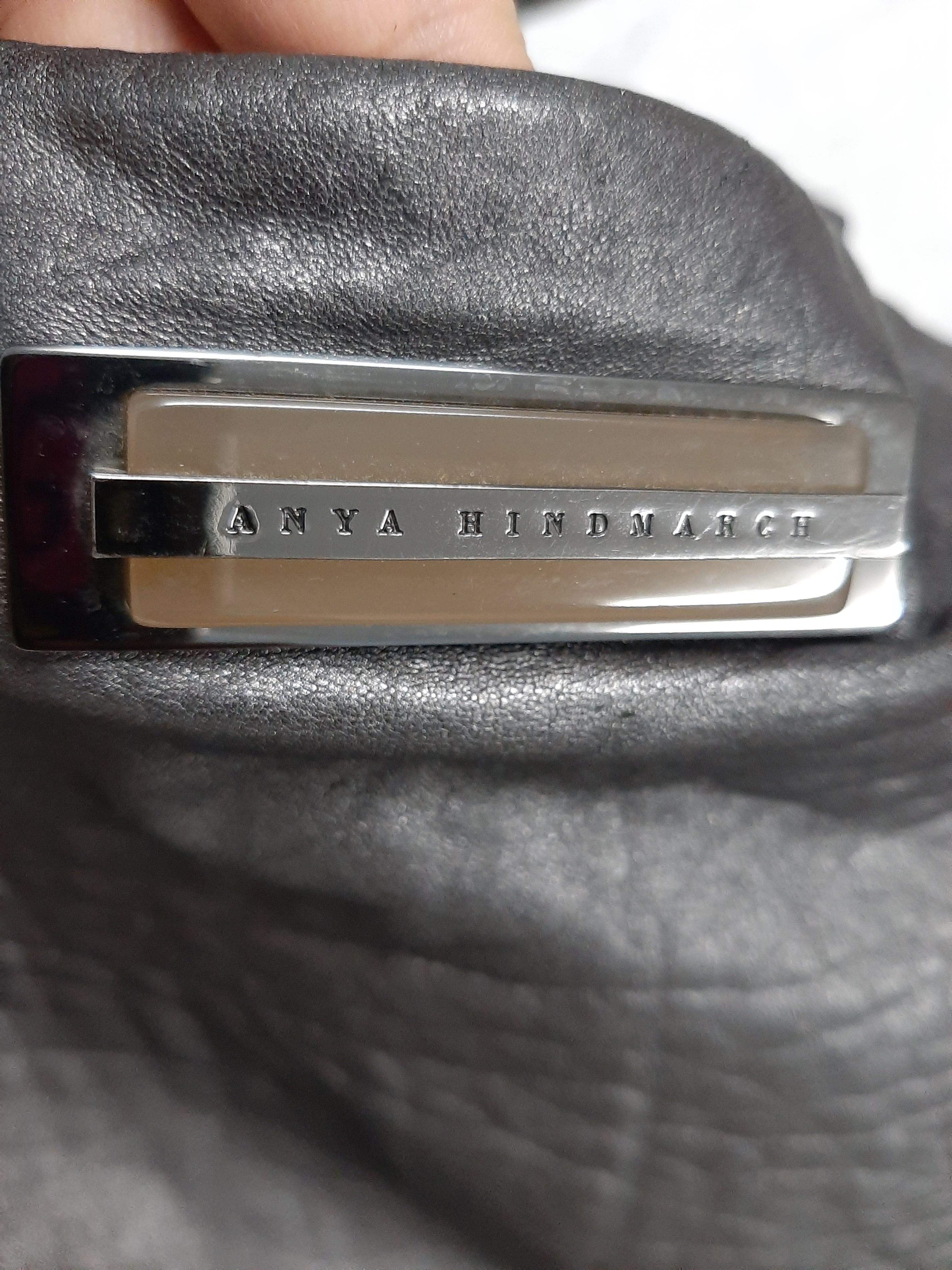 Anya Hindmarch Bag (Category: Luxury Bags & Wallets) located in Paranaque City. Submitted by andim8 (Listing ID 285554019, Image 3). Description: Anya Hindmarch Peggy Bag in Pewter, studded handle. Rank AB 9/10. Guaranteed Authentic. No notable flaws.