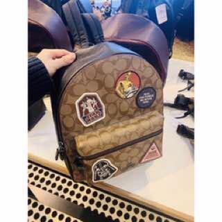 Medium charlie backpack hotsell in blocked signature canvas