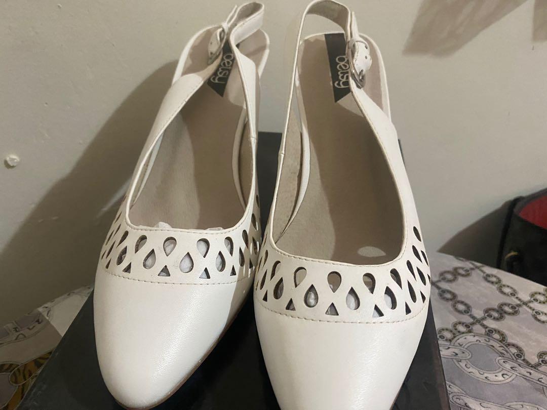 Betsy White heels (Category: Heels) located in Rizal. Submitted by elan_byk (Listing ID 285656773, Image 1). Description: Betsy White heels bought @ Zalora S 39 Brand New. (I forgot it sa box kaya nagpeel off at the back part, can be painted with white nail polish para di halata) Price: P 500 only - For inquiries: DM/Viber - 💌Order Form: (📱 Viber 09157612138) Name: Address: Contact#: MOP: (BDO BPI Metrobank) Date of Payment: Shipping Option: (C