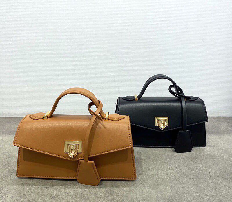 top handle trapeze bag