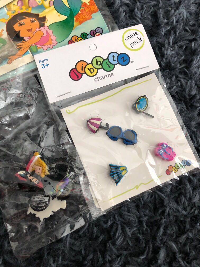 Crocs Jibbitz whole set 36 bitz + 4 boards Disney Thomas Dora, Luxury