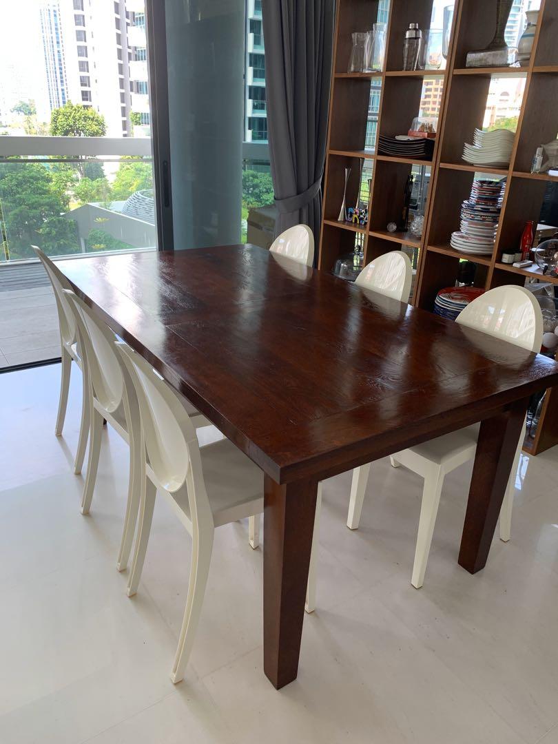Extendable Dining Table (Category: Tables & Sets) located in Singapore. Submitted by moan1978 (Listing ID 285591255, Image 1). Description: Natural wood table 181.5cm length x 100 cm width Extendable 50.5 each side Total 282.5 cm length .