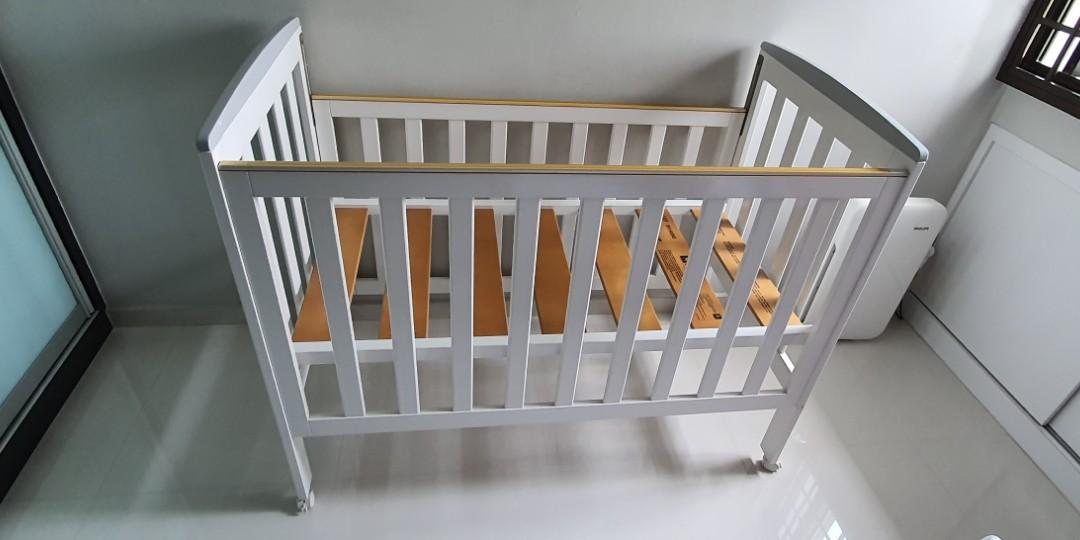 white timber cot