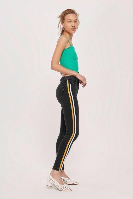 White jeans with black side stripe on sale