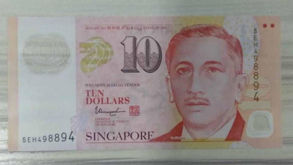 $10 Note (Category: Currency) located in Singapore. Submitted by sg50_notes (Listing ID 285879606, Image 1). Description: 💡UNC 💡Radar number 498894 [sold] 💡UNC 💡Special number 192219 [sold] ✴Radar number 550055 [sold] ✴Repeated number 393939 [sold] ✴ Fold in the middle for last photo ✴ Repeated number 336622.