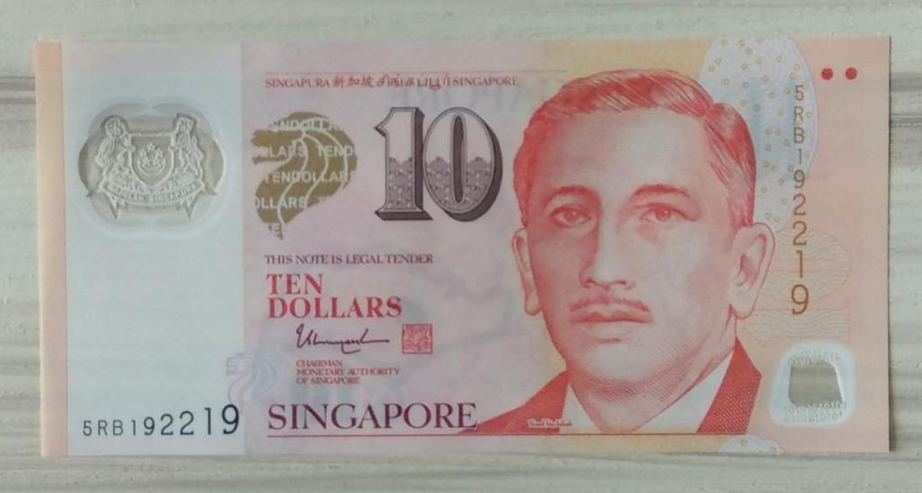 $10 Note (Category: Currency) located in Singapore. Submitted by sg50_notes (Listing ID 285879606, Image 2). Description: 💡UNC 💡Radar number 498894 [sold] 💡UNC 💡Special number 192219 [sold] ✴Radar number 550055 [sold] ✴Repeated number 393939 [sold] ✴ Fold in the middle for last photo ✴ Repeated number 336622.