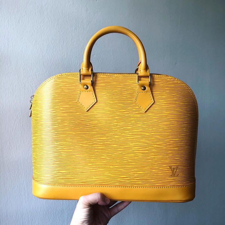 Sold at Auction: Louis Vuitton, Louis Vuitton Yellow Epi Leather Alma PM  Satchel