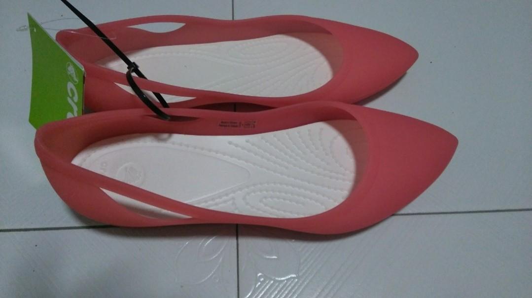 Crocs sandals in Coral pink colour for 