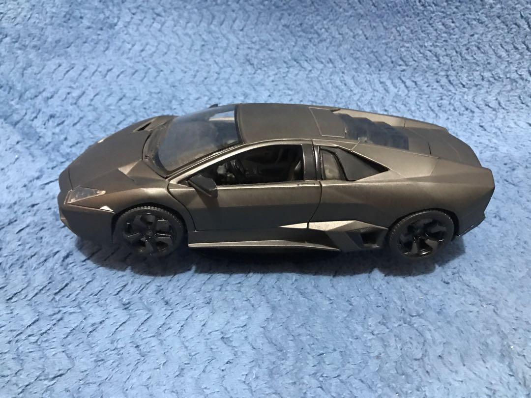 Burago Lamborghini Reventon 1:18 Matte Black (Category: Vehicle & Diecast Models) located in Del Monte. Submitted by dennis.1682 (Listing ID 285924272, Image 1). Description: 1:18 Scale Displayed in Cabinet With Box Moving parts have no issues.