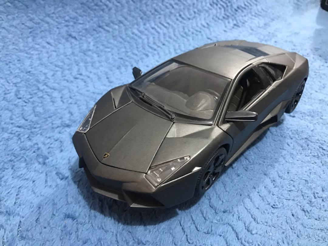 Burago Lamborghini Reventon 1:18 Matte Black (Category: Vehicle & Diecast Models) located in Del Monte. Submitted by dennis.1682 (Listing ID 285924272, Image 2). Description: 1:18 Scale Displayed in Cabinet With Box Moving parts have no issues.