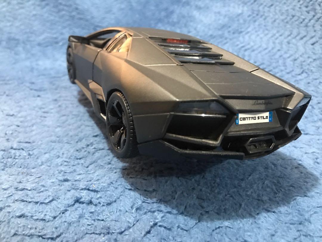 Burago Lamborghini Reventon 1:18 Matte Black (Category: Vehicle & Diecast Models) located in Del Monte. Submitted by dennis.1682 (Listing ID 285924272, Image 3). Description: 1:18 Scale Displayed in Cabinet With Box Moving parts have no issues.