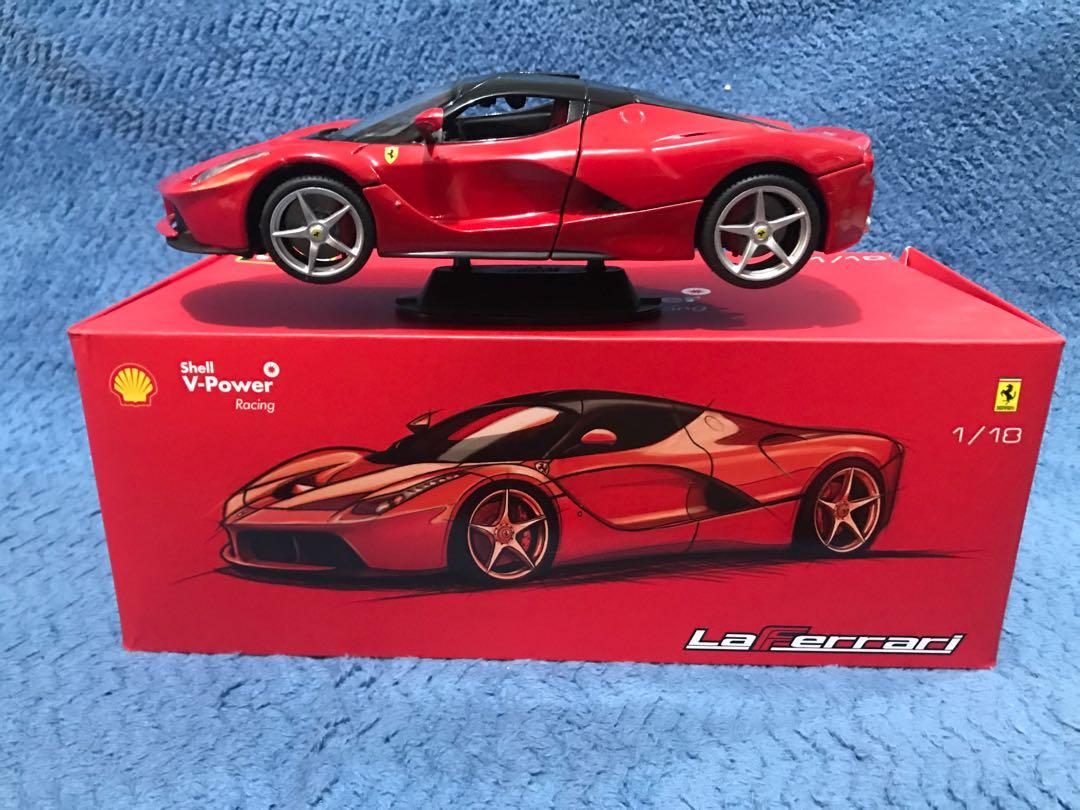 Burago Shell La Ferrari 1/18 (Category: Vehicle & Diecast Models) located in Quezon City. Submitted by dennis.1682 (Listing ID 285924115, Image 1). Description: 1/18 Scale Displayed in Glass Cabinet From personal collection All Moving Parts have no issues With Box but without Styro inserts Feel free to haggle .