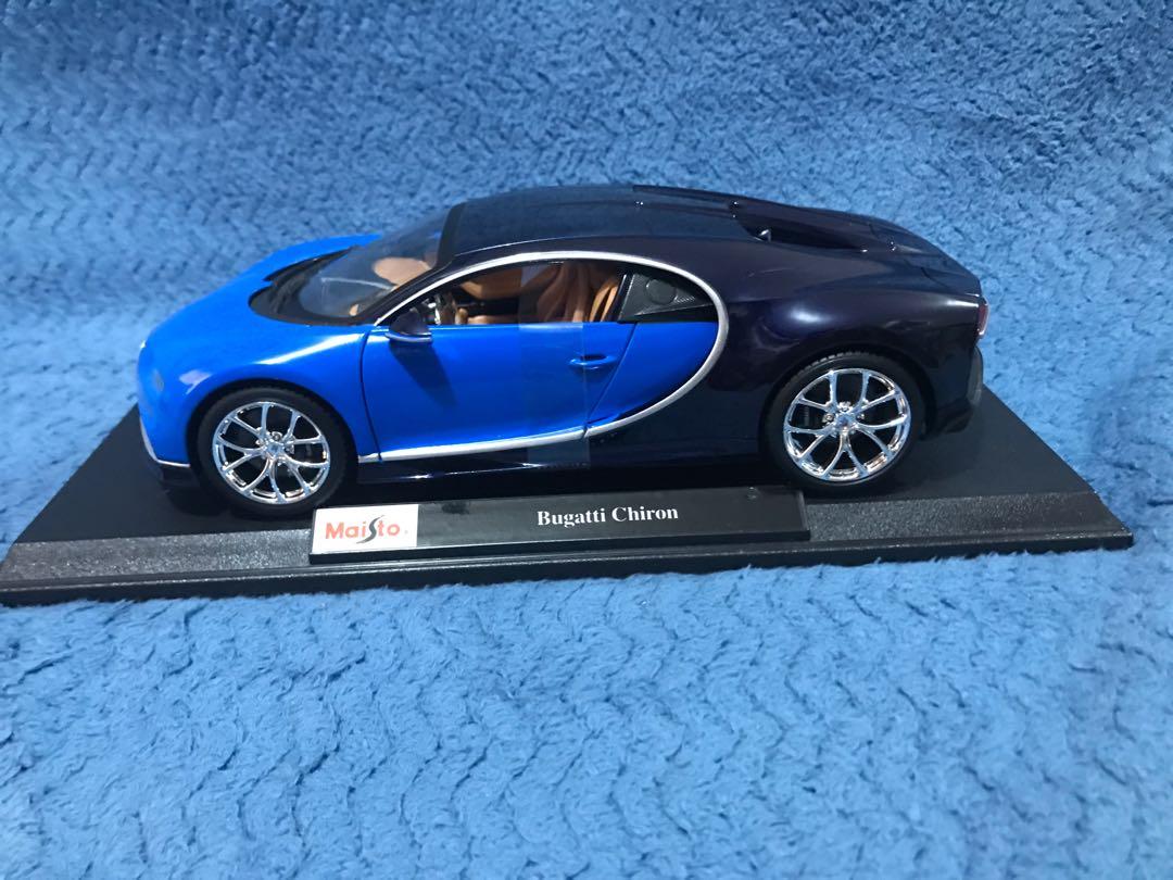 Maisto Bugatti Chiron 1/18 (Category: Vehicle & Diecast Models) located in Del Monte. Submitted by dennis.1682 (Listing ID 285924781, Image 1). Description: 1/18 Diecast No box Intact to base Good as New with few light scratches (See last 2 photos) Selling for Funds.