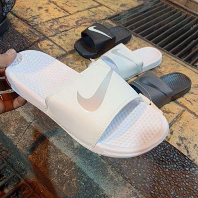 selipar nike original