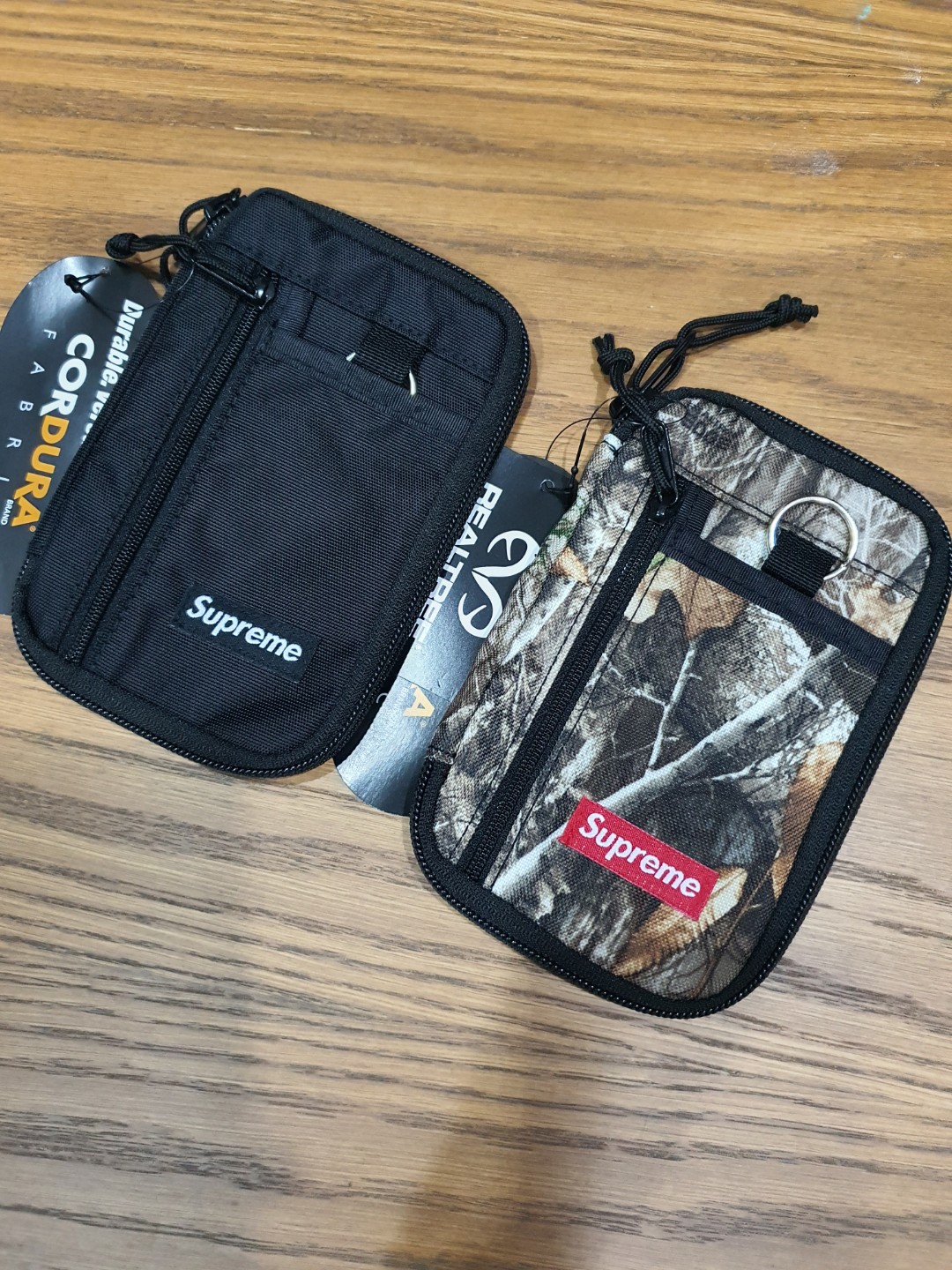 Supreme wallet black and camo Fw19