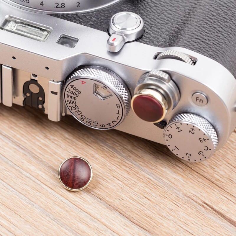 Handmade soft shutter button (Category: Other Photography Accessories) located in Singapore. Submitted by artisans_n_craft (Listing ID 286198031, Image 1). Description: Description: wood and brass rim Color: - red - golden - black Suitable for all cameras with threaded shutters! PM me for more details!.