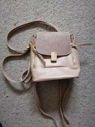 Cream mini backpack / black shoulder bag