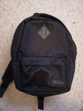 Mini black nylon backpack