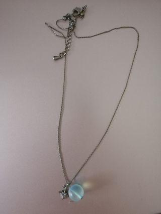 Transparent blue ball pendant with star necklace