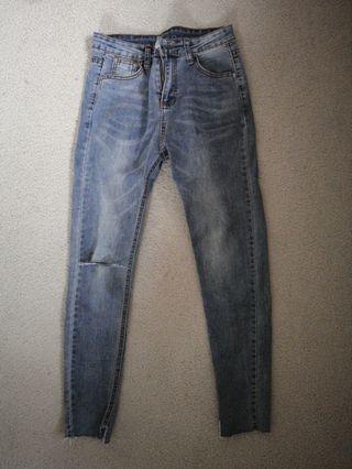 Washed out denim jeans