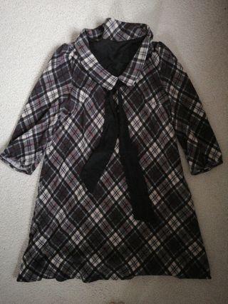 Girly one-piece with black ribbon