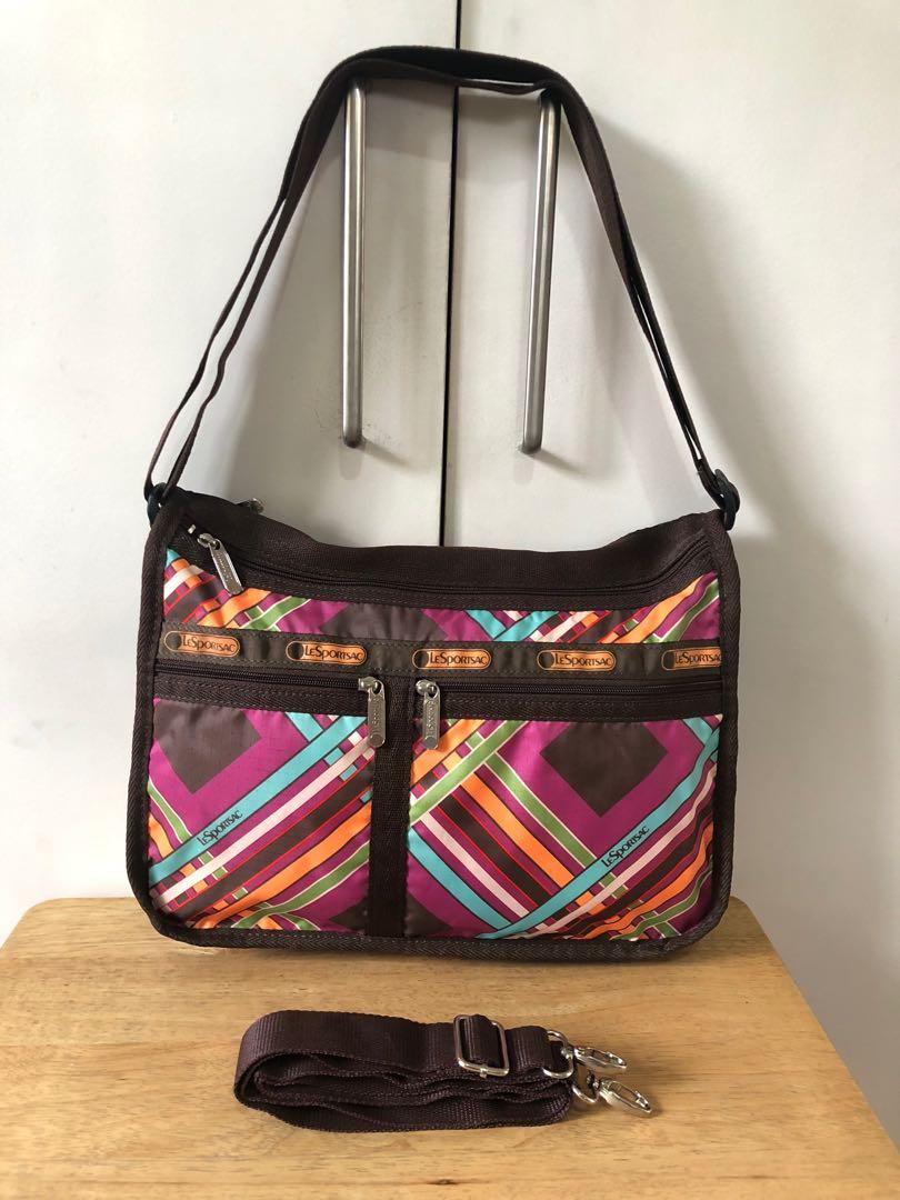 LeSportsac Crossbody Sling Bag - Authentic (Category: Cross-body Bags) located in Quezon City. Submitted by Madyys (Listing ID 286431747, Image 3). Description: *REPRICED FROM 2,500* Brand new, authentic, US-bought. LeSportsac crossbody sling bag Multipockets, with separate pouch. Expandable. Bag size: L 14” H 9” W 4-6” Pouch size: 7 X 8.5” *Never used*.