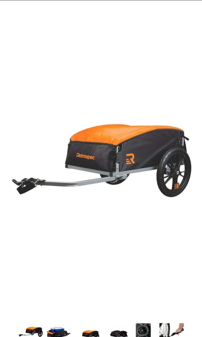 tow wagon behind bicycle