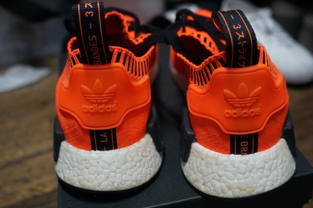 Adidas nmd r1 orange noise hotsell