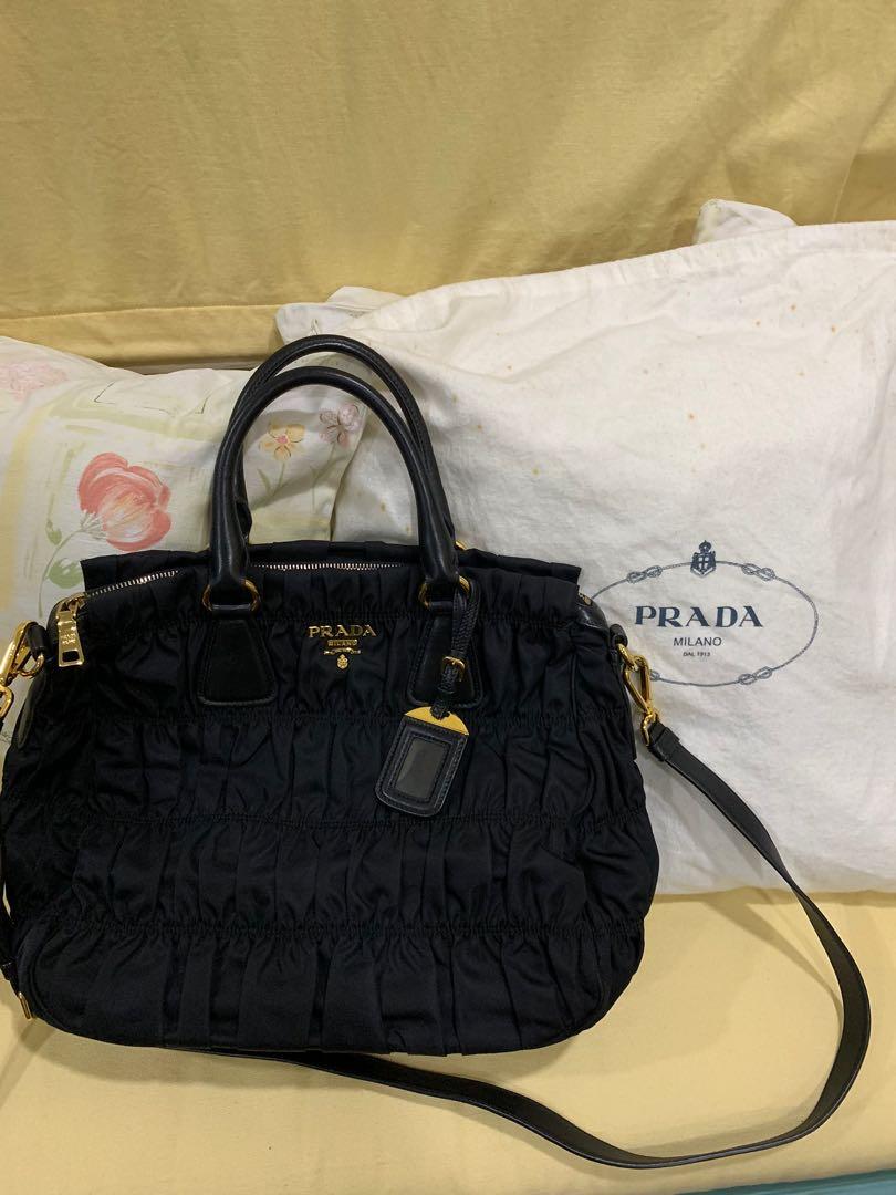Authentic Prada Tessuto Gauffre (Category: Luxury Bags & Wallets) located in Paranaque City. Submitted by lovebrand (Listing ID 287110125, Image 1). Description: Like new No flaws Bought from Guam Comes with dustbag, card and paper bag No low balling please.