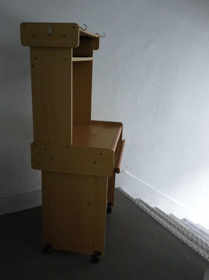 Computer Table (Category: Tables & Sets) located in Singapore. Submitted by mathan090909 (Listing ID 287130371, Image 2). Description: Computer rack with cd rom slots and retractable key board table. Has rollers for easy mobility.