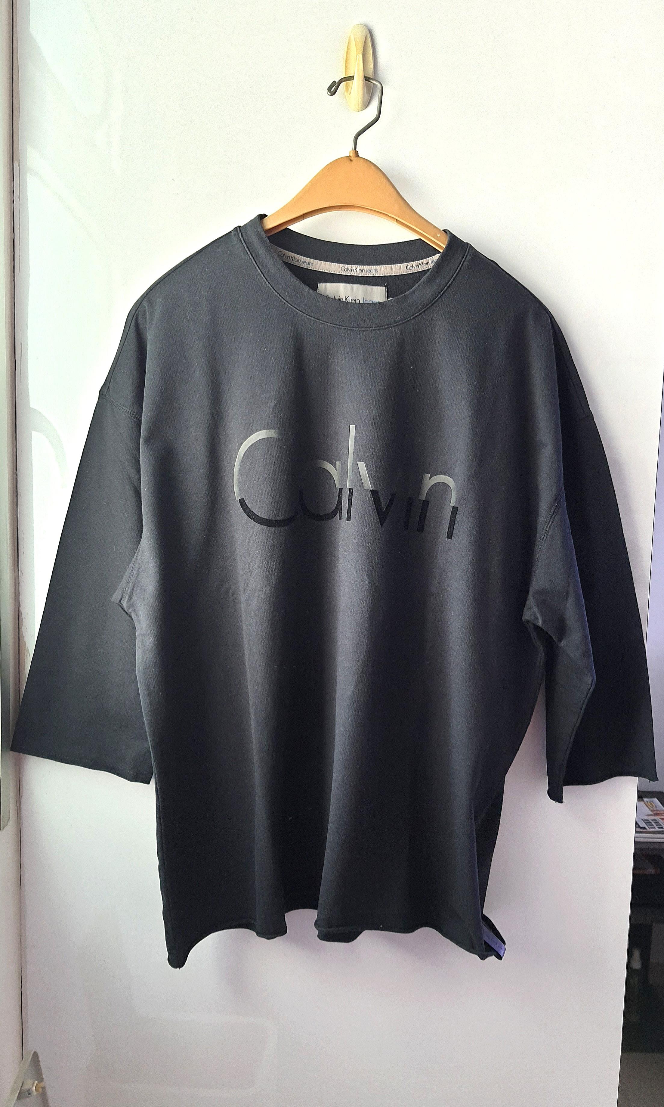 CK Calvin Klein Jeans Oversized T shirt, Men's Fashion, Tops & Sets, Tshirts  & Polo Shirts on Carousell