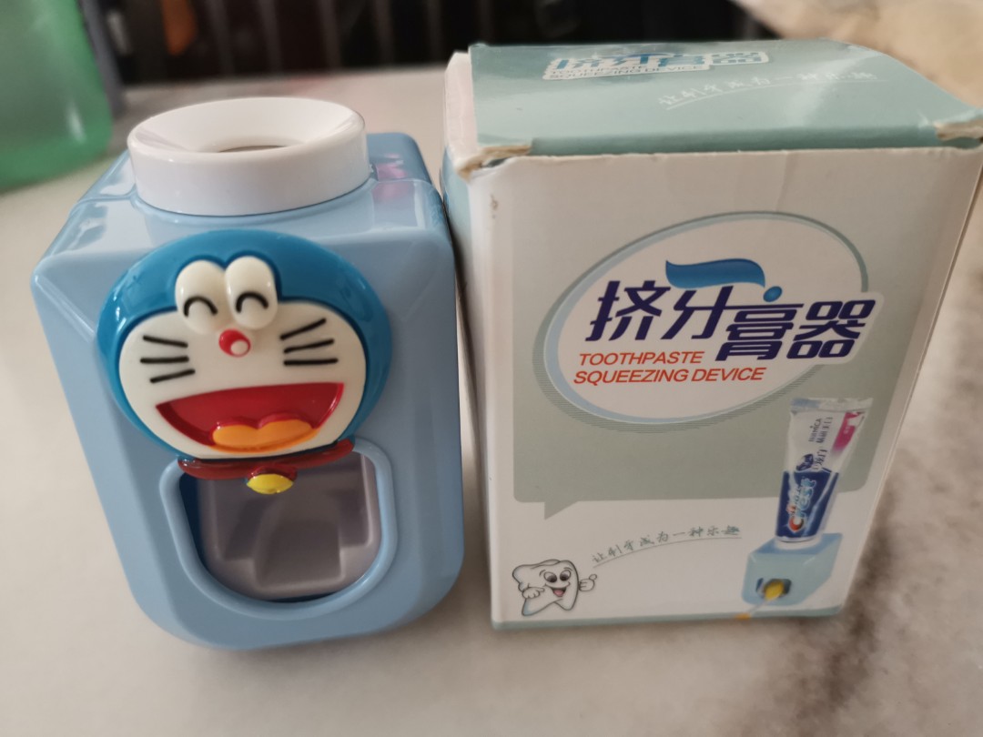 Doraemon toothpaste dispenser, Home Appliances, Kitchenware on Carousell