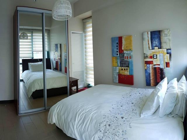 Condo for Rent BGC 8ForbesTown Road 2BR with balcony fully furnished