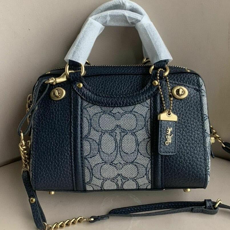 Coach lark bag 19 sales