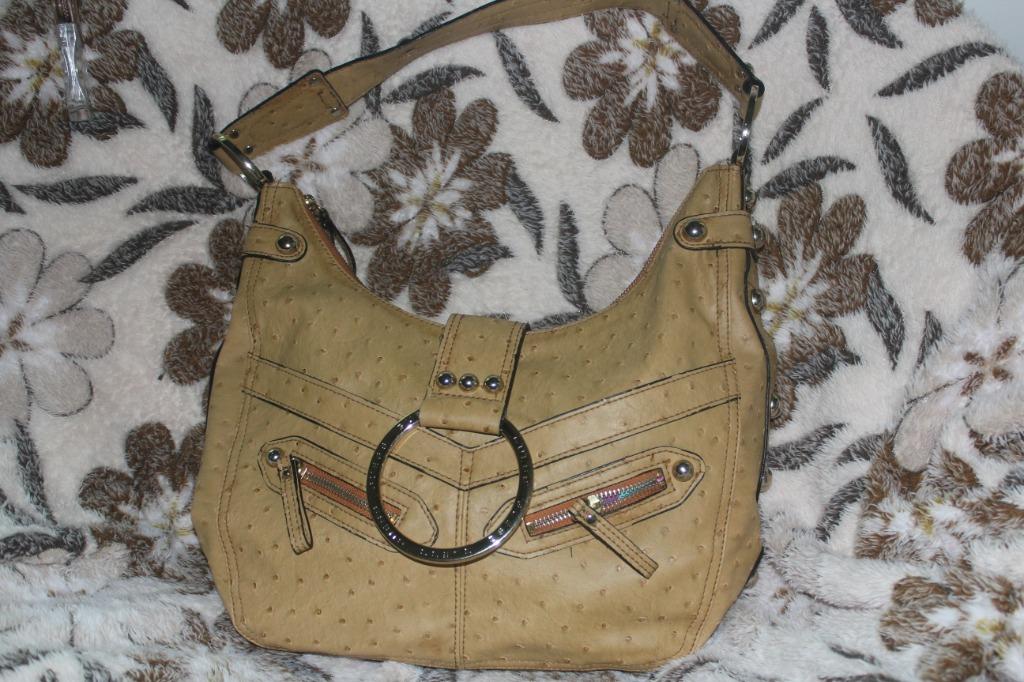 Guess bag (Category: Luxury Bags & Wallets) located in Calamba. Submitted by shing-shingscollection (Listing ID 1038739751, Image 1). Description: Authentic Guess bag Ostritch type leather This is a preloved bag so manage your expectation. NO RETURN, NO EXCHANGE POLICY Last price 1500+SF Disclaimer: Cassy @shing-shingscollection is not associated or affiliated with the brand holders. All copyrights reserve to the original brand holder..