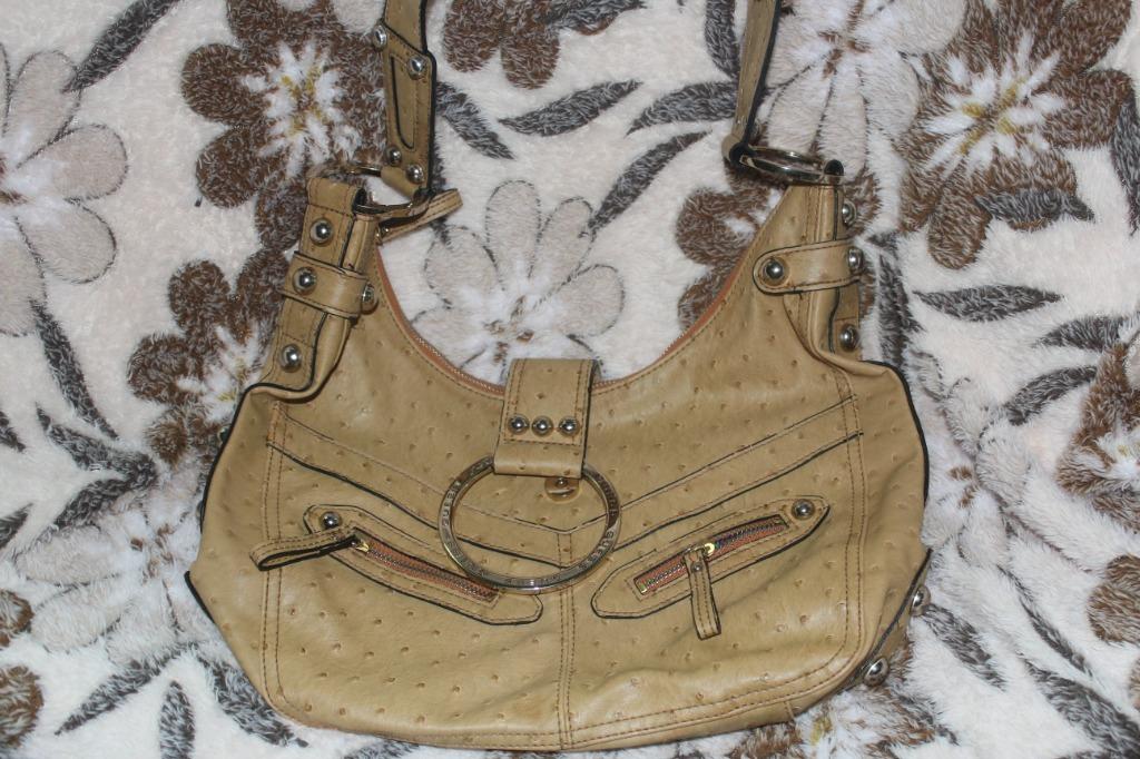 Guess bag (Category: Luxury Bags & Wallets) located in Calamba. Submitted by shing-shingscollection (Listing ID 1038739751, Image 2). Description: Authentic Guess bag Ostritch type leather This is a preloved bag so manage your expectation. NO RETURN, NO EXCHANGE POLICY Last price 1500+SF Disclaimer: Cassy @shing-shingscollection is not associated or affiliated with the brand holders. All copyrights reserve to the original brand holder..